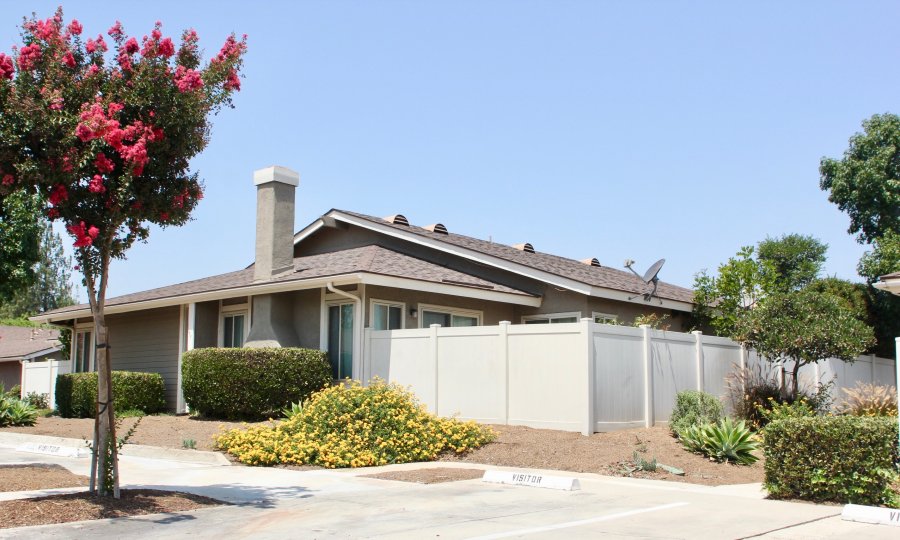 A house was surrounded by the beautiful different type of flowers in Magnolia Glen.