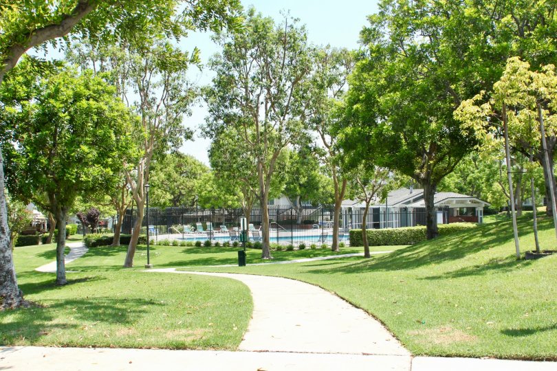 In ground swimming pool and clubhouse on a beautiful day in the Gallery community of Corona, CA.