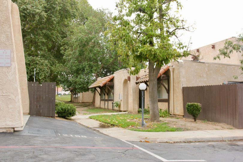 Trees, sidewalk, fencing and homes during a day in the community of Lakeview Sunnymead community in Moreno Valley, California
