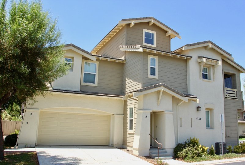 A beautiful morning in Murrieta, California the green trees emphasizing the beauty of this home in Amberwalk at Ivy Community.
