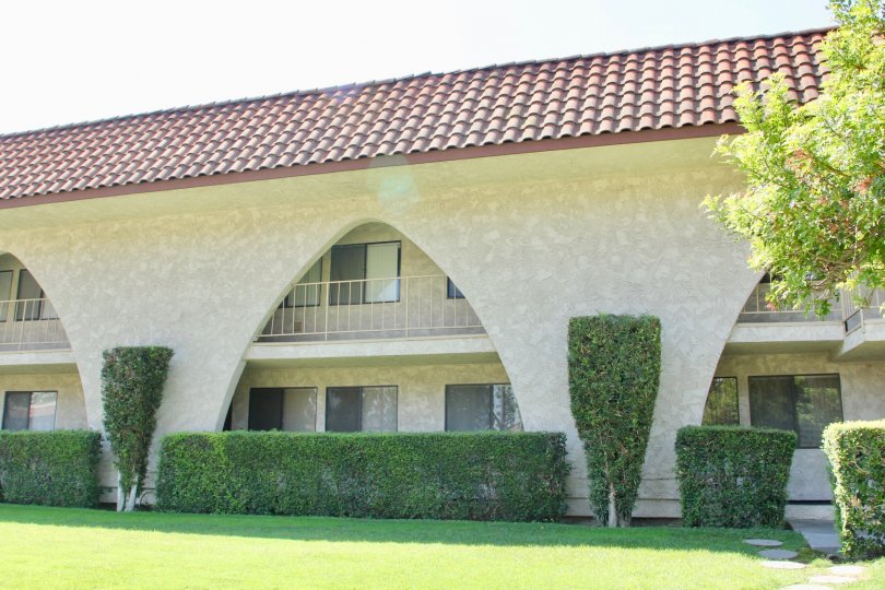 Arches reach from the bottom to the second floor on a condo building at Country Club Villas.