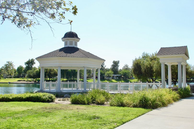 Savannah at Harveston temecula California very nice building come to direct sun shine near to big lake and green grasses tree
