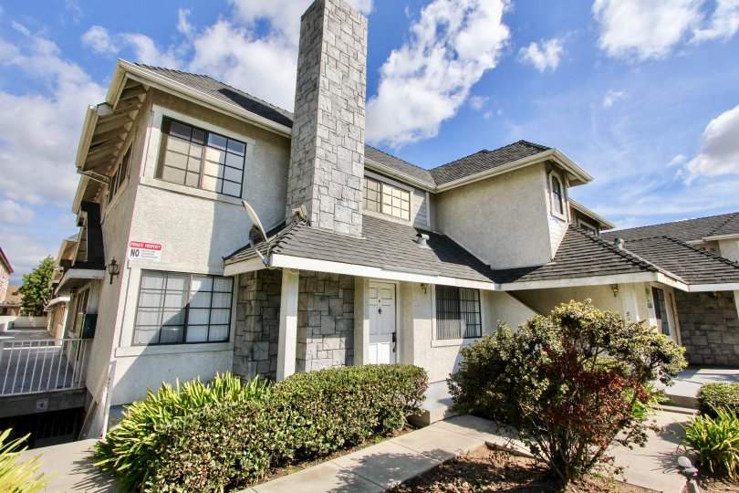 A big, beautiful house in Chinese Gardens community in Alhambra, California on a bright day