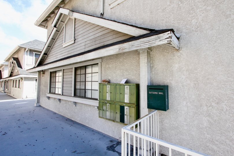 The green mailboxes for the Chinese Gardens community in Alhambra, California are shown on a sunny day.