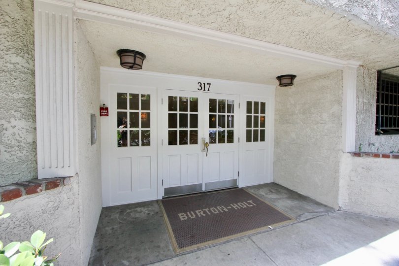 A great welcoming entrance outside of this Holt community
