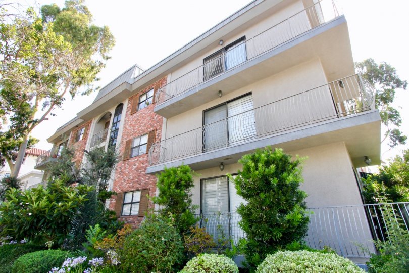 amazingly beautiful side shot of 152 S Oakhurst Dr with it's cool flowers, Beverly Hills, California