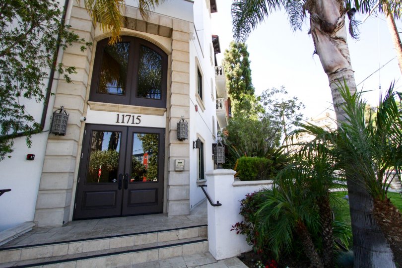 Stairs lead to the front entry of 11715 Chenault condos