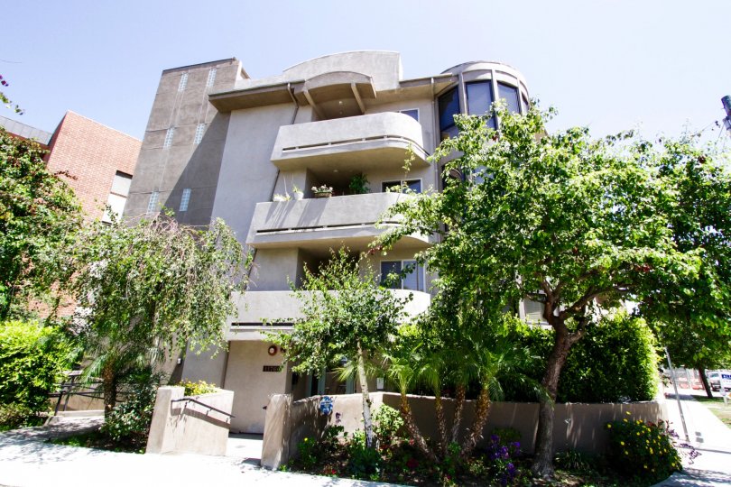 Lush landscape fills the front planters of Sunset Granville