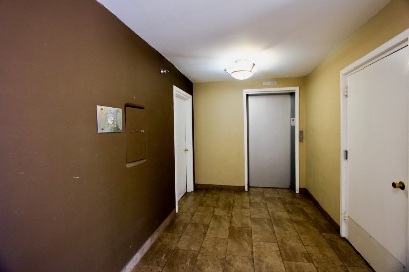 A nice white door for an apartment complex in Brentwood.