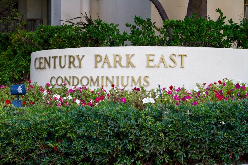 In gold letters on a raised planter is the Century Park East marquee