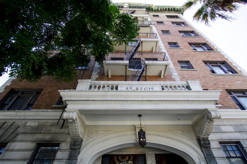 A fire escape is on the front center of the St Regis building