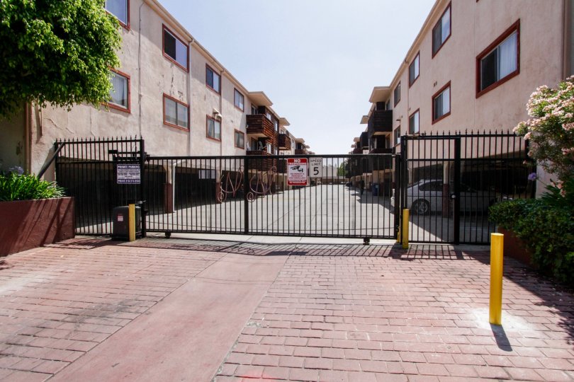 The gate going into the private parking of 5400 Newcastle Ave