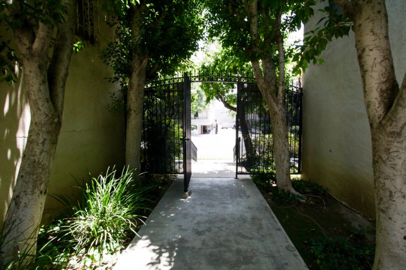 The gated entrance leading into the common area of Encino Gardens
