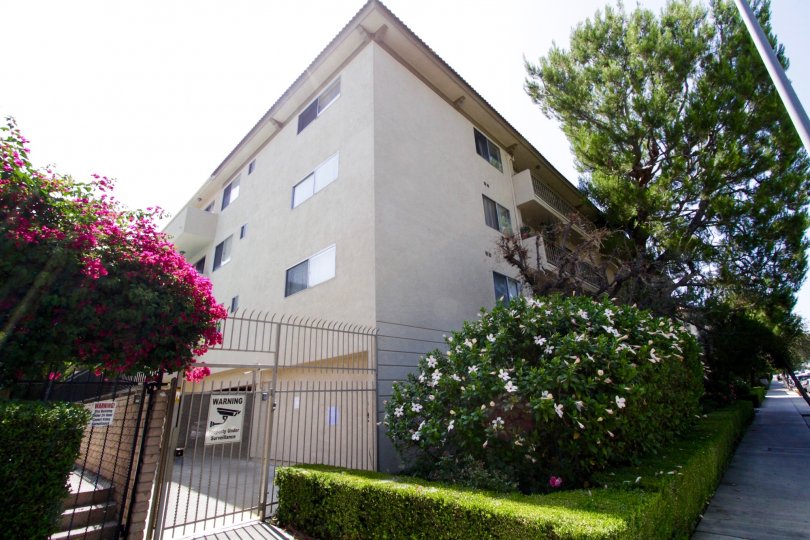 The gated side entrance to Ports of Call Condominiums