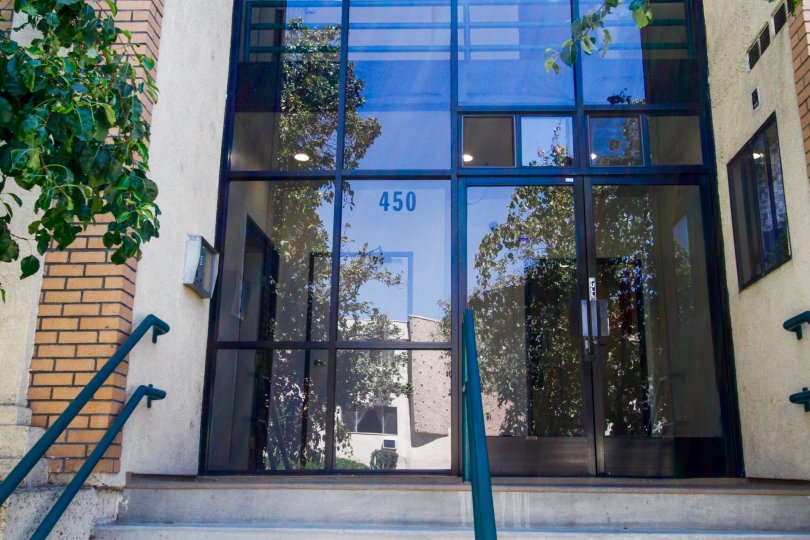 The address for Dryden Villas written on the windows
