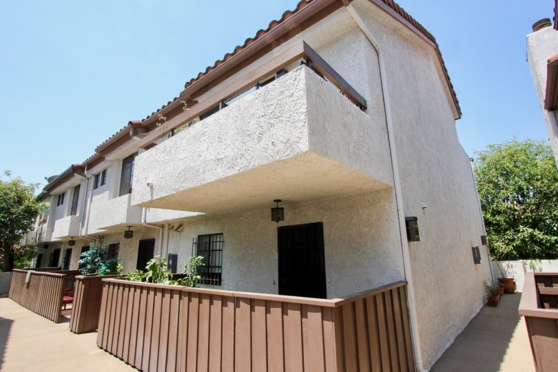 A bright day in the Chateau Marmont with the side view of a house.