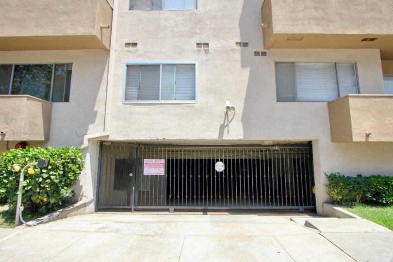 Parking entrance at San Marcus with security camera and call box. Personal terraces and big windows.