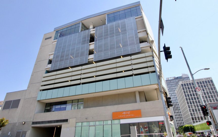 Midrise building, retail on first level. Solair, Hancock Park, California