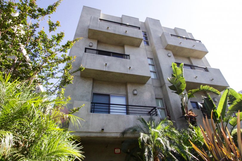 Made of concrete The Mark has smooth lines and black metal railings as an accent