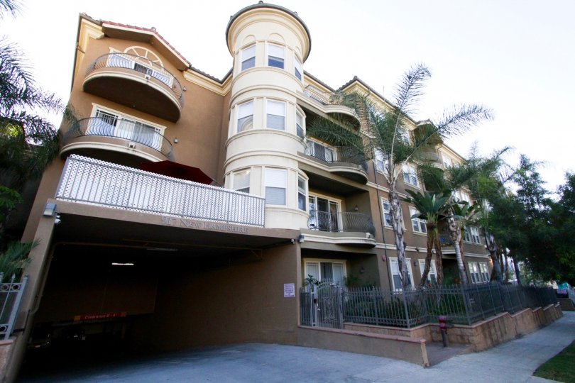 The corner units of The Kensington offer oversized round balconies with ballooning railings