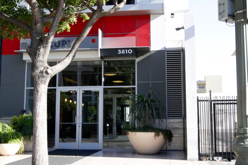 A glass door leads to the lobby of The Mercury