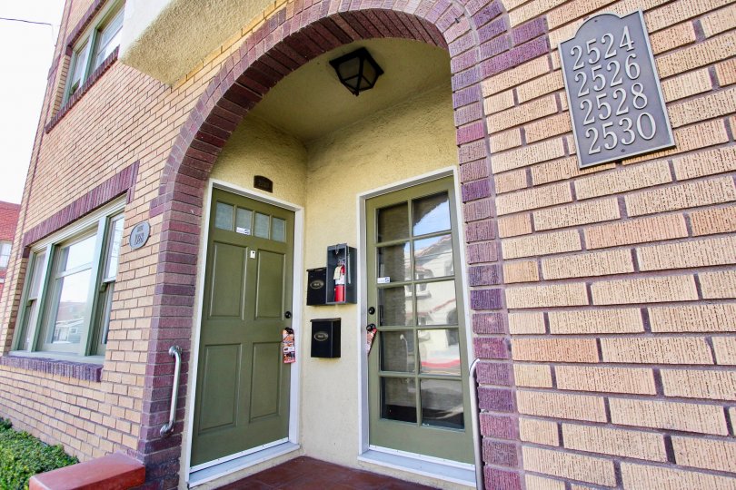 The arch in the building at the entrance of 10th and Molino