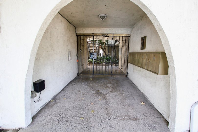 The security gate for access into 360 Gladys Ave in Long Beach, California