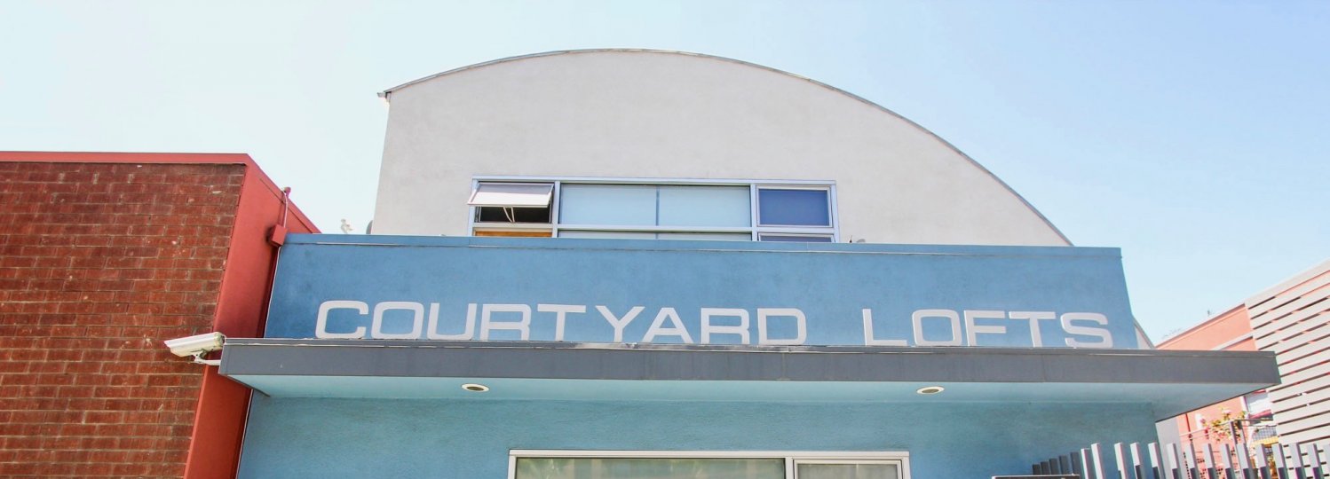 The Courtyard Lofts name above the entrance