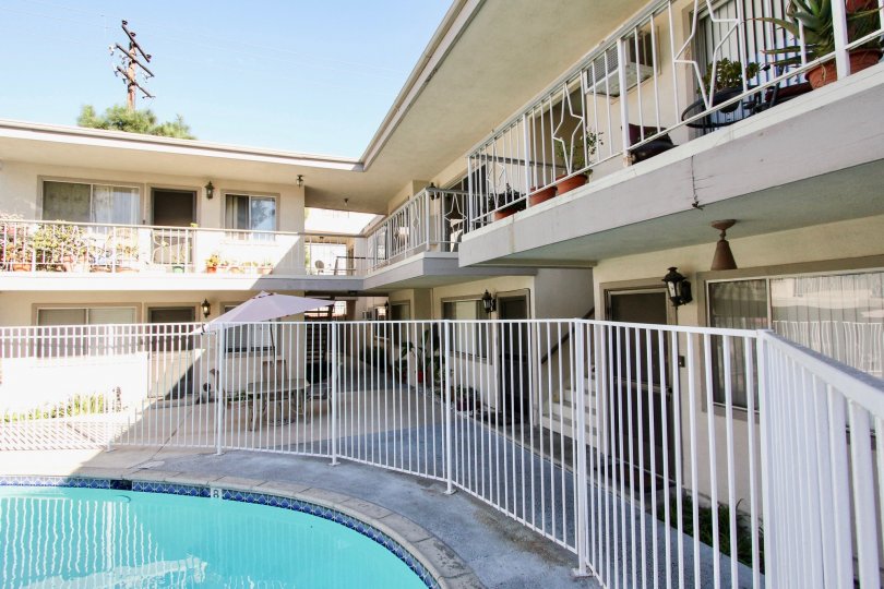 The fence around the Elmwood Villas pool