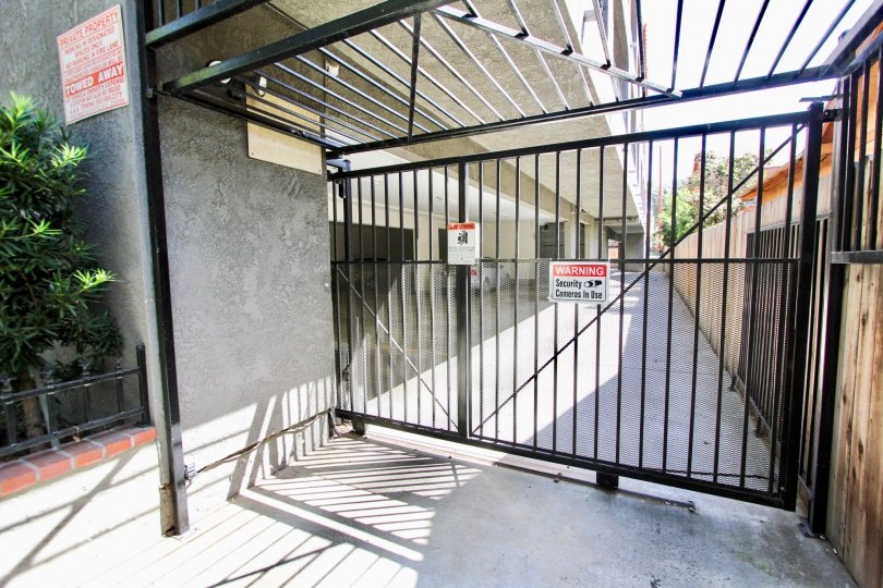 The gate into the parking area of Ohio Manor