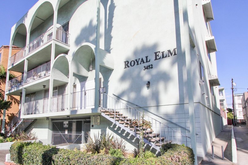 The address for Royal Elm on the building