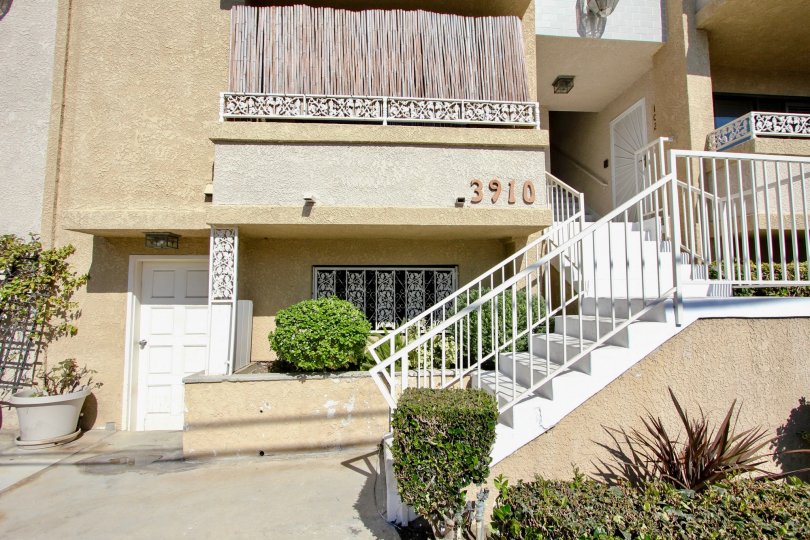 The stairs leading up to 3910 Moore St