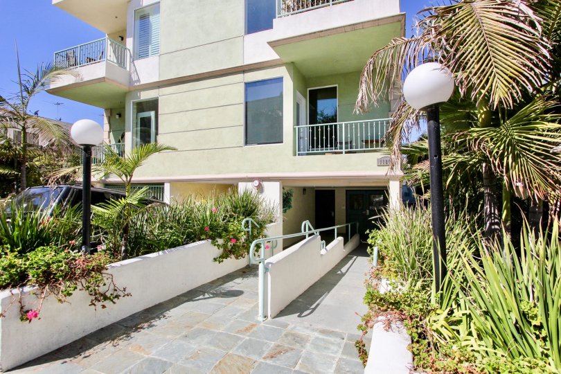 The sidewalk in front of Avon Villas