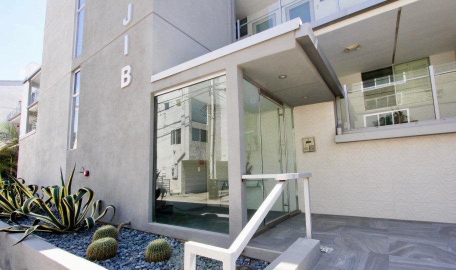 A glass door in a building called jib in 4 jib community