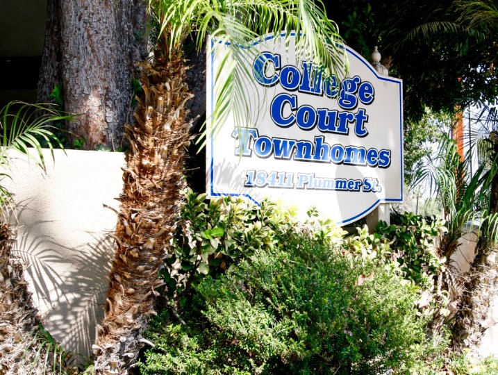 The welcoming sign for College Court Townhomes