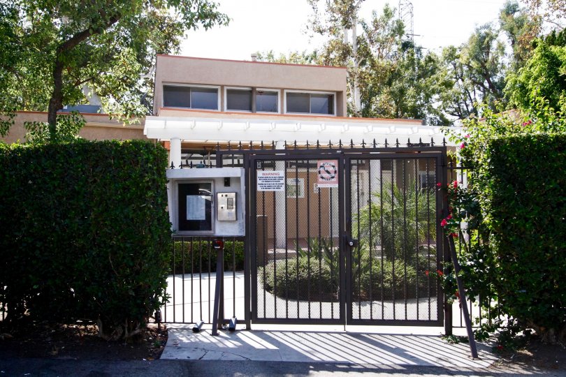 The gates into Village Northridge