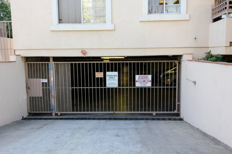 The gate into the parking area of 449 N Catalina Ave
