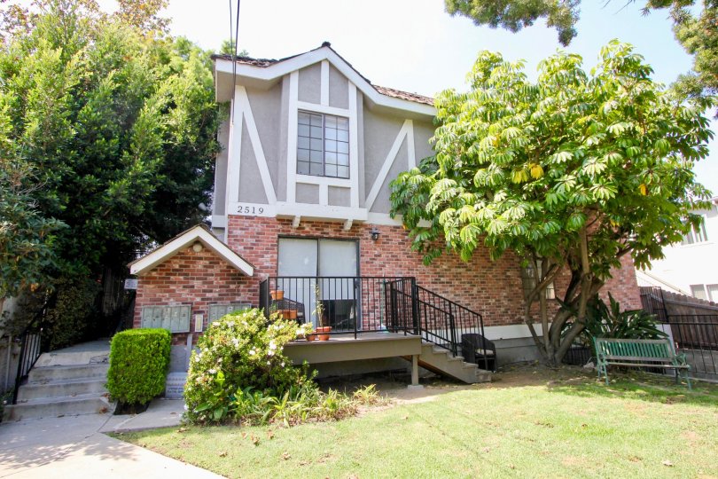 A Coventry house in the downtown of Santa Monica with tree attached to it.
