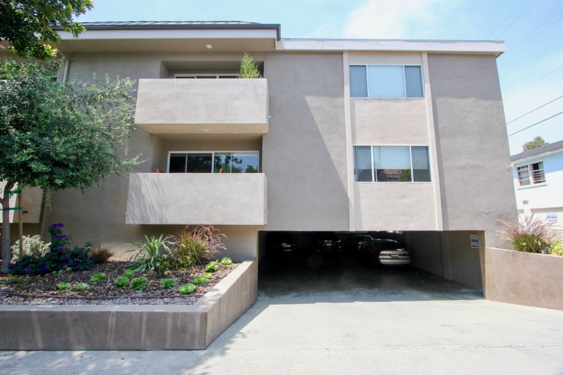 Residential building in Princeton Villa which has two floors a parking garage, and front garden.