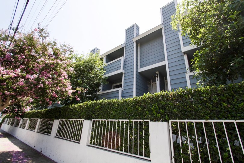 The fence around the property of Burbank Townhomes