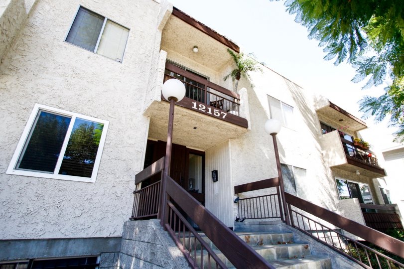 The address seen at 12157 Moorpark St on the building
