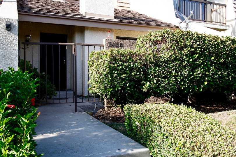 The fence seen around Tarzana Villas North
