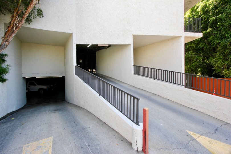 The shady driveway and entrance ramp at Horn Plana in West Hollywood.