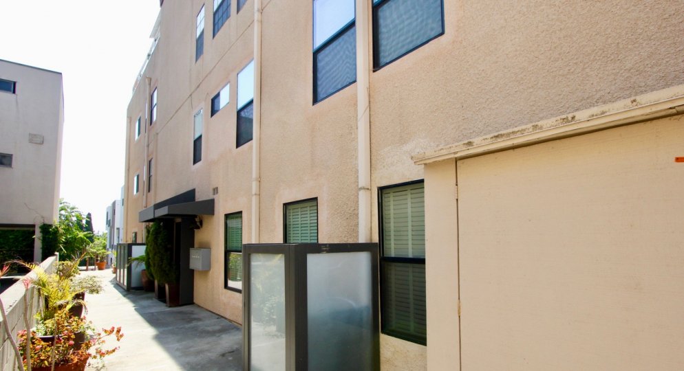 A sunny day at Ozeta Terrace, a modern building with an industrial feel.