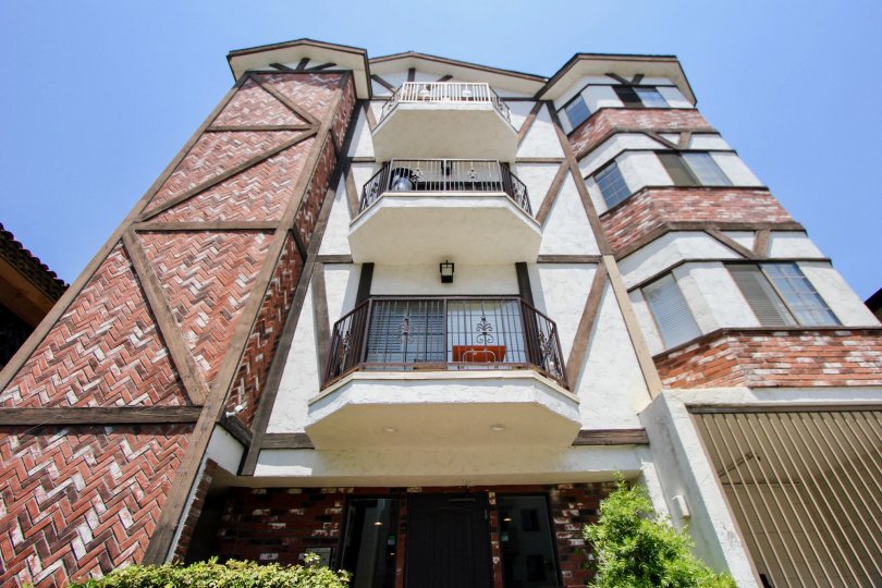 A lovely 3 story building community with patios and nice weather
