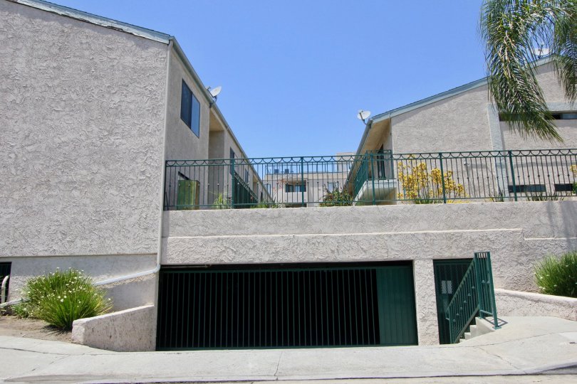 underground parking of apartment complex with gate and staircase walkway at Park Purdue