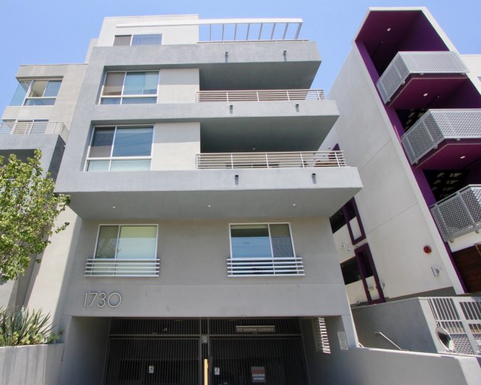 Purple colored Corridor in a 4 story building with a pent house at St Johns wood in West LA California