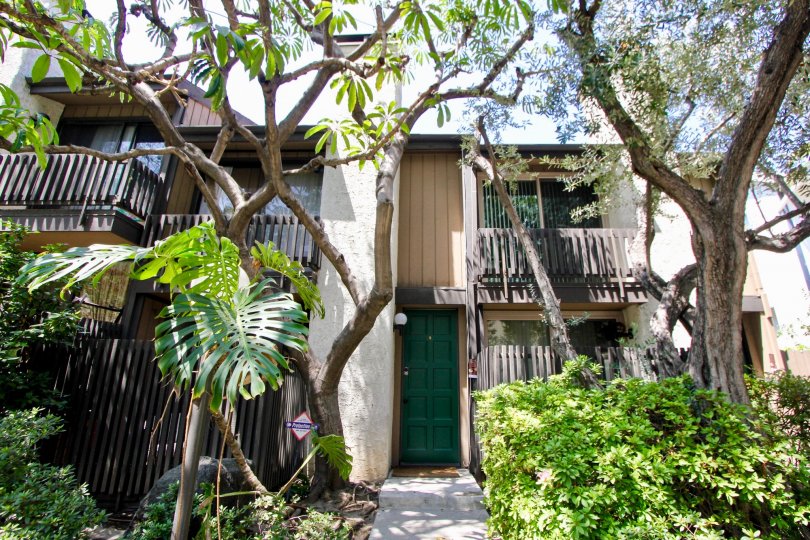 Plants and trees provide plenty of shade for balconies at Bentley Village in Westwood California.