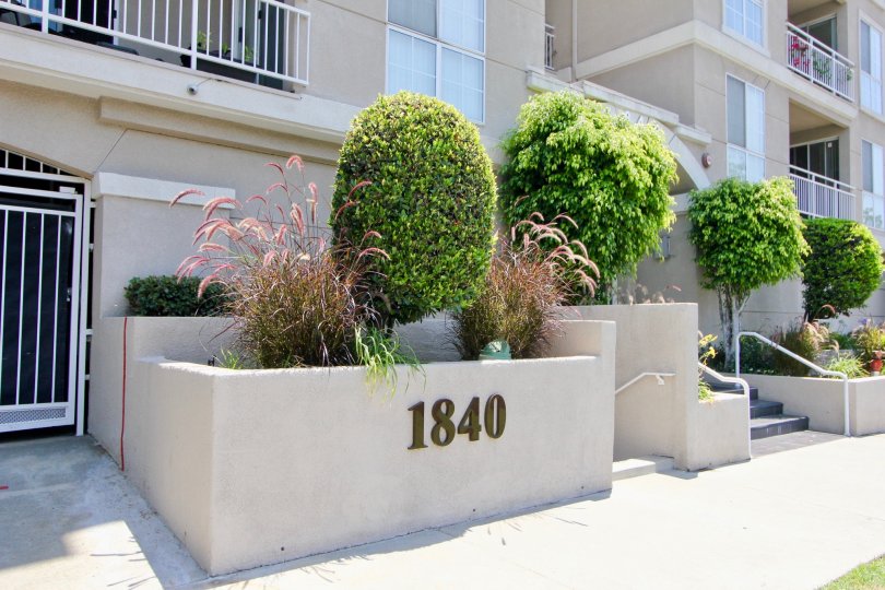a building with plants in the front in Beverly Landmark I
