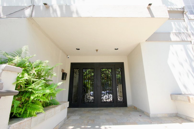 THE COURTYARD AND THE CAR PORCH IN THE CENTURY GLEN TOWNHOMES